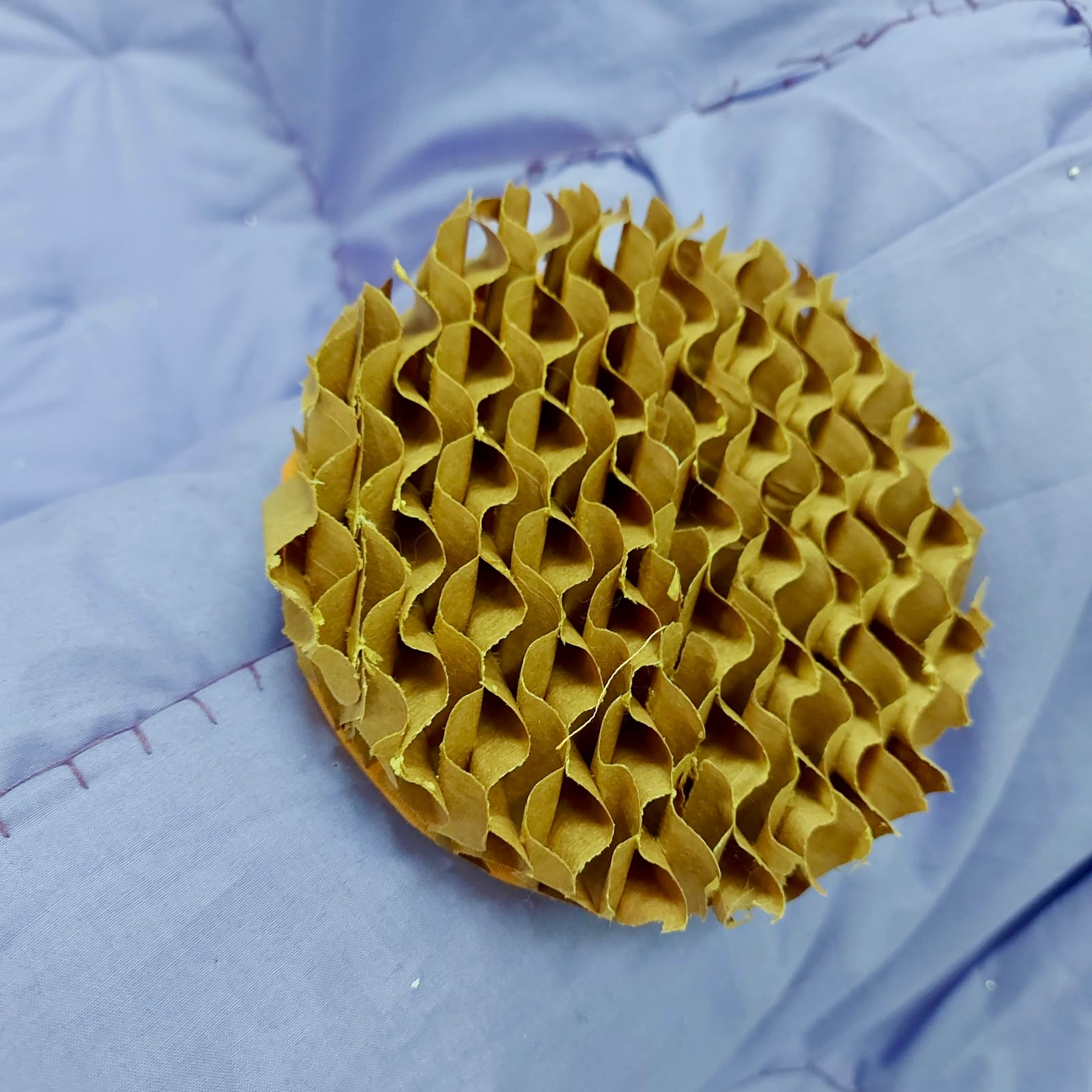 Patch of corrugated honeycomb paper