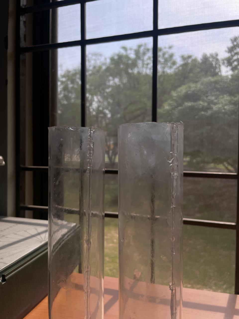 Two bonded acrylic cylinders
