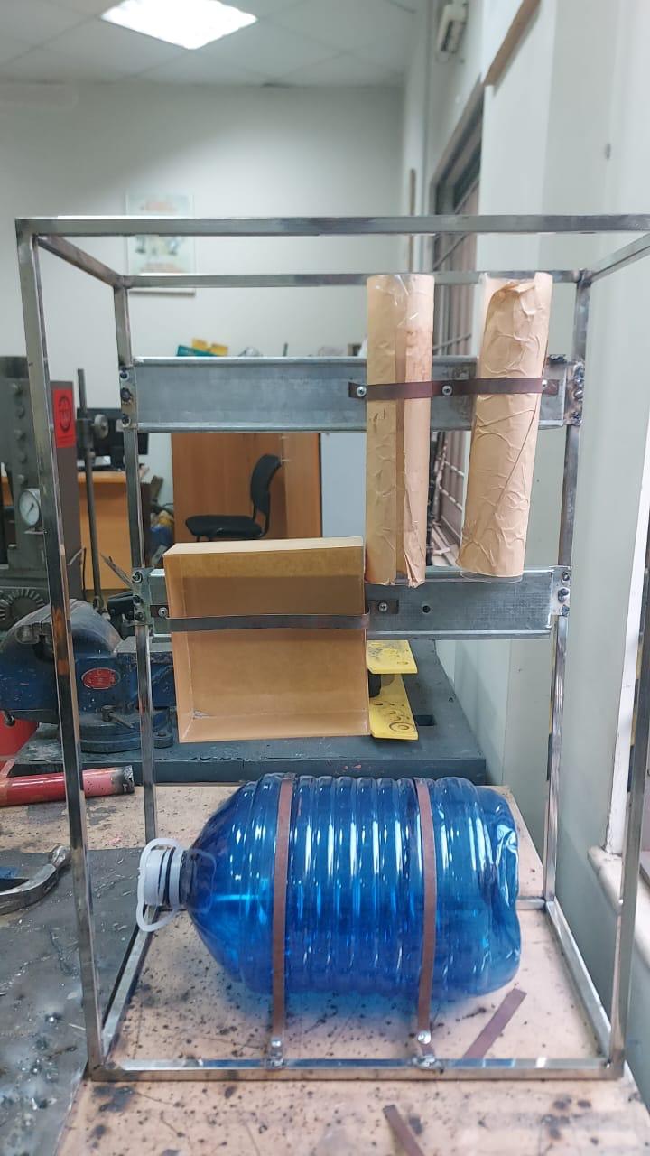 Assembled frame with chambers and storage bottle