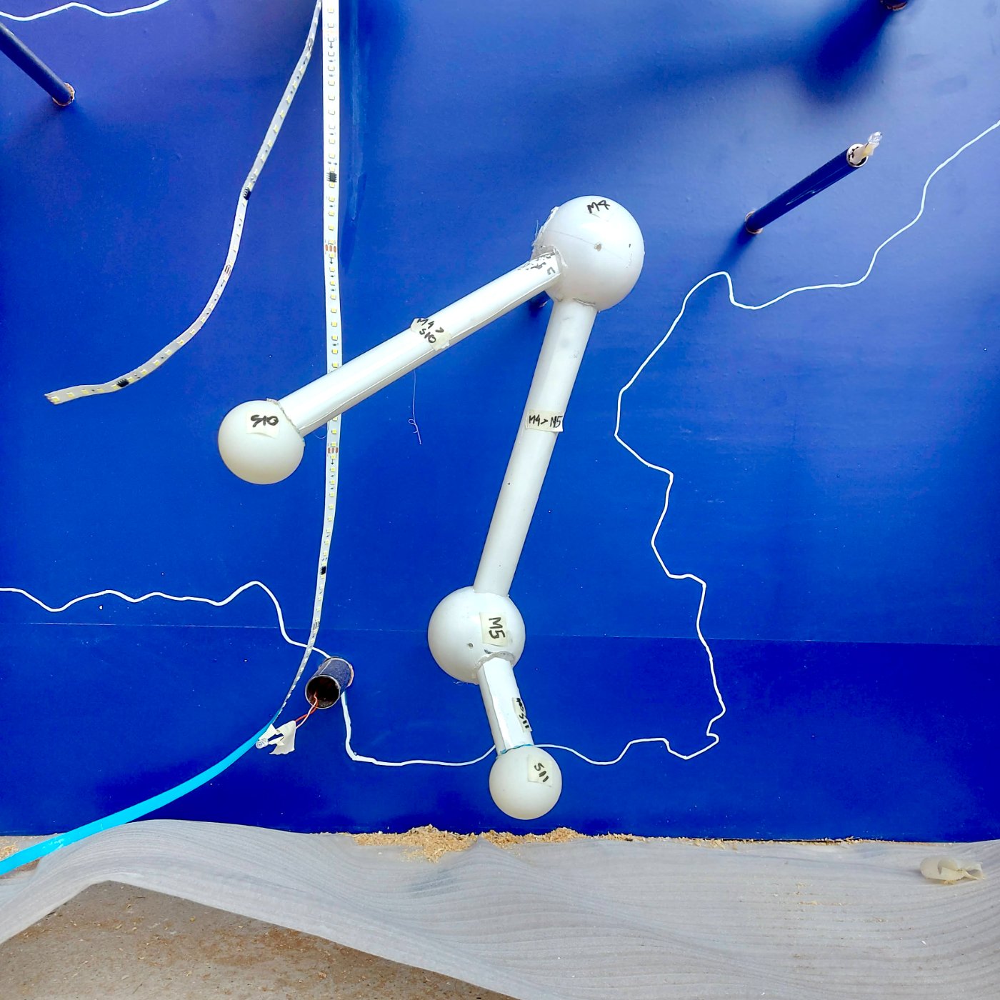 Close-up of sphere joints and empty rod holes