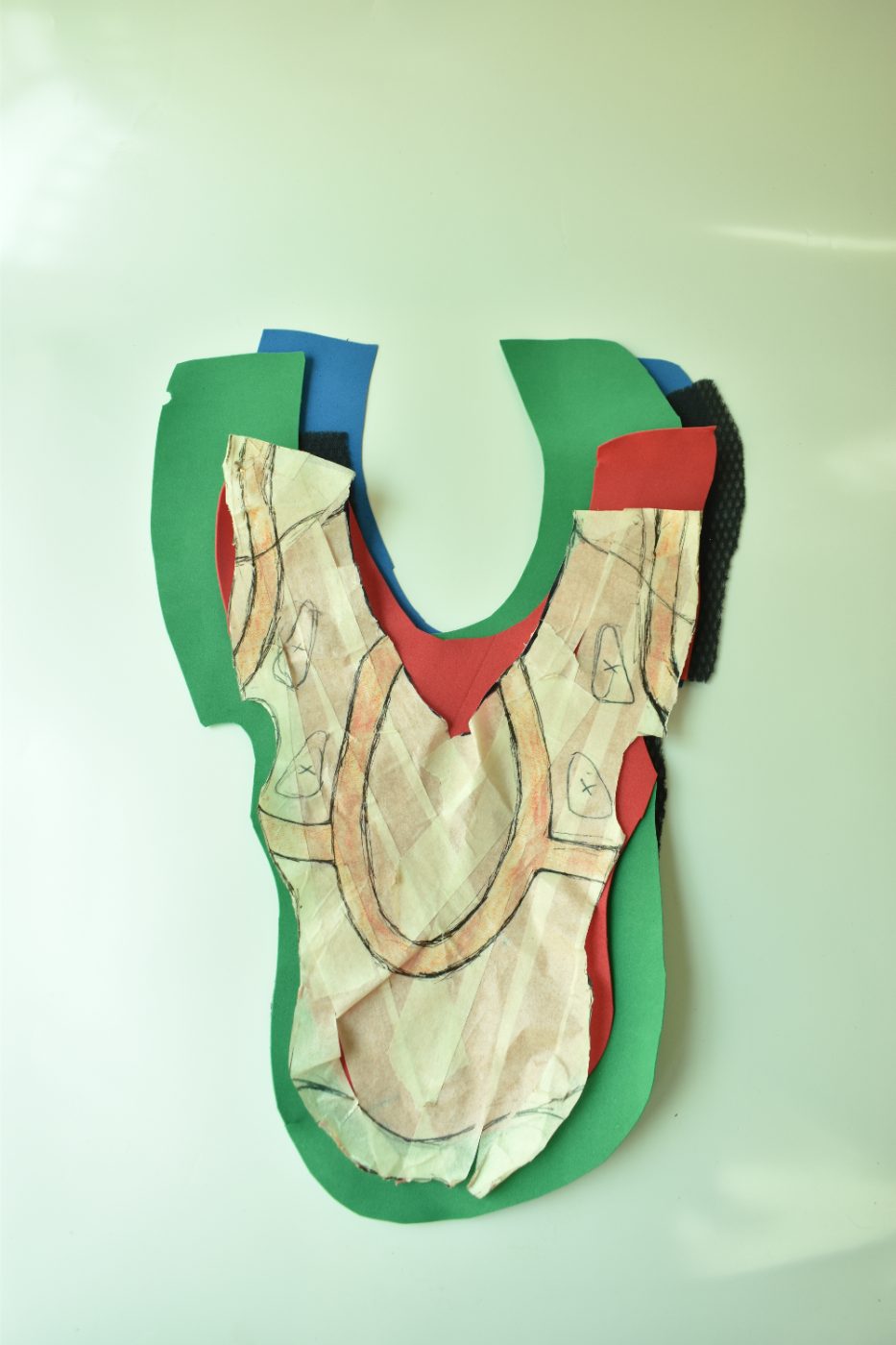 Pattern pieces cut in paper, foam and mesh